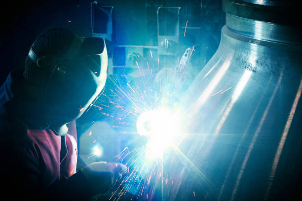 istock An industrial worker with welding steel 1049412500