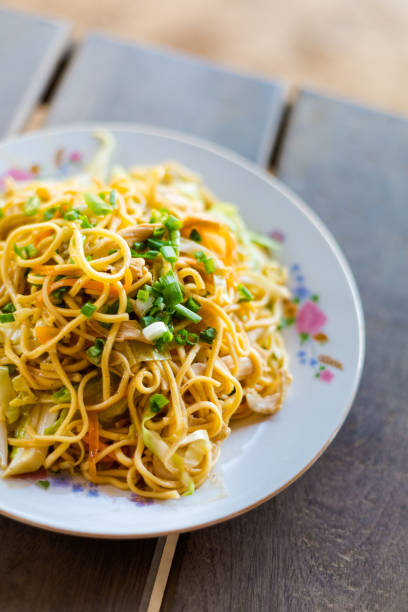 istock Lao spaghetti stirfry chicken 1049415378