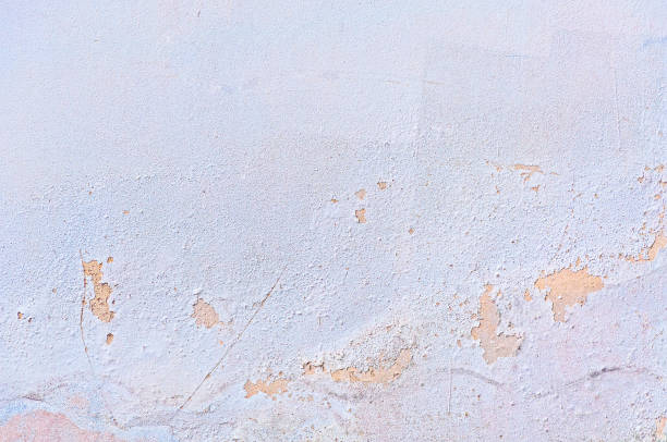 istock Grungy wall with large crack cement floor texture 1049415532