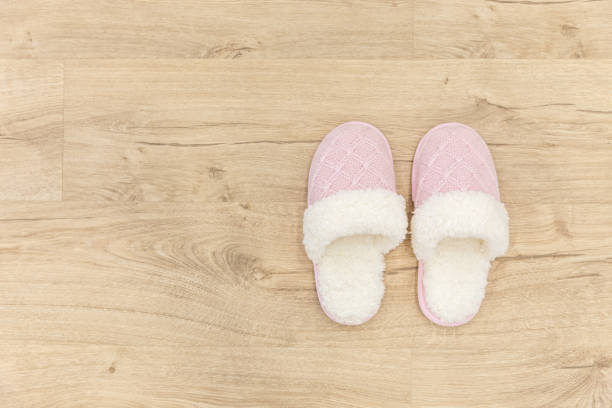 istock Pink cozy knitted slippers 1049425794