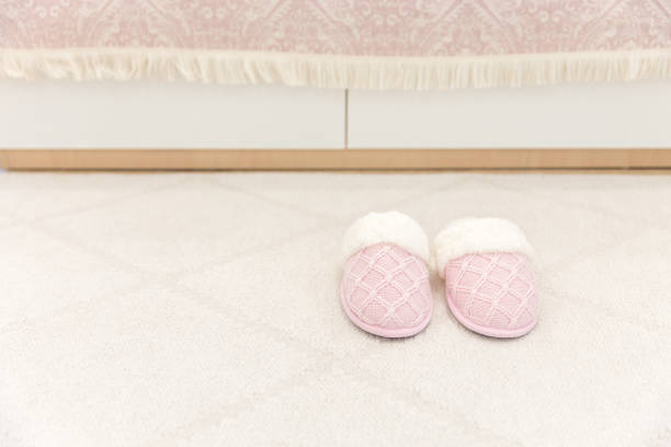 istock Pink cozy knitted slippers 1049426164