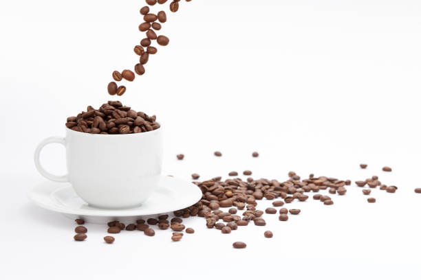 istock Coffee Beans and Cup Isolated on White Background 1049433650