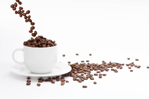 istock Coffee Beans and Cup Isolated on White Background 1049433710