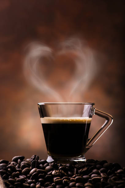 istock coffee in a cup with heart-shaped steam 1049441764