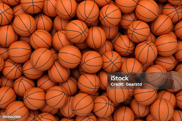 Render 3d De Muchas Bolas De Baloncesto Naranja En Una Interminable Pila De Visto Desde Arriba Foto de stock y más banco de imágenes de Baloncesto