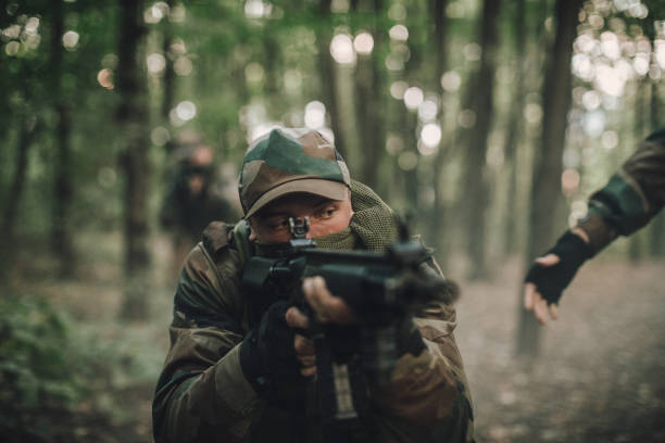 istock Army on a mission in wilderness 1049453794