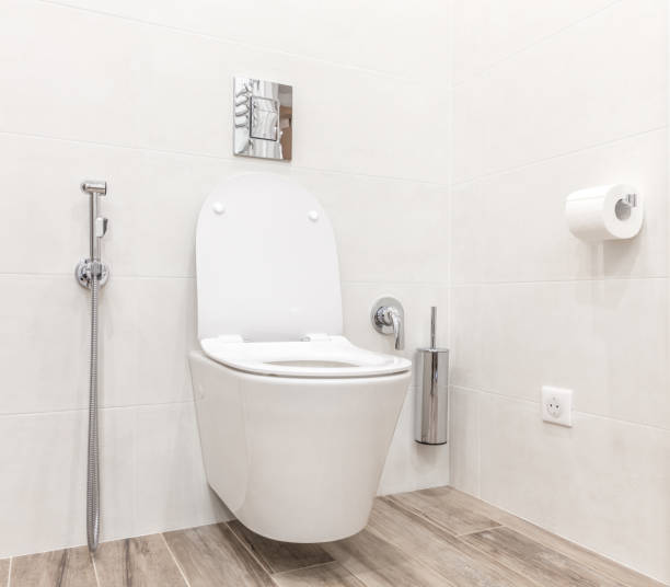 istock Toilet bowl in modern white style bathroom 1049458282