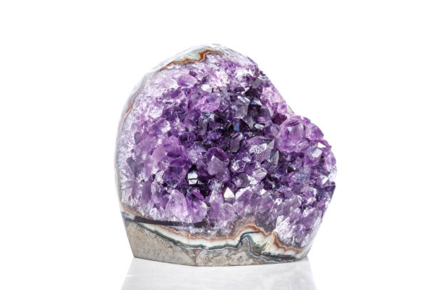 istock Amethyst Crystal Druse  macro mineral on white background 1049462602