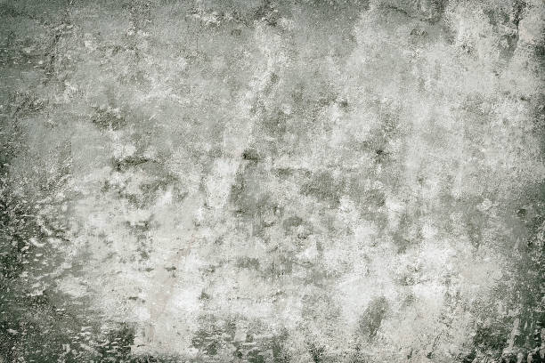 istock Grey grunge background. Abstract texture of a concrete wall 1049465472
