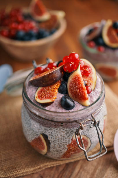 istock Healthy Yogurt with Chia Fresh Figs, Blueberries and Redcurrants 1049469612