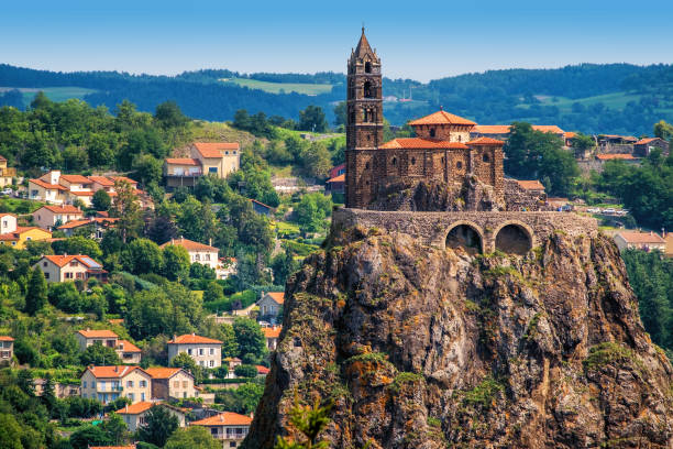 Saint Michel d'Aiguilhe Chapel in Le Puy en Velay, France Saint Michel d'Aiguilhe chapel sitting on a rock in Le Puy en Velay, France auvergne rhône alpes stock pictures, royalty-free photos & images