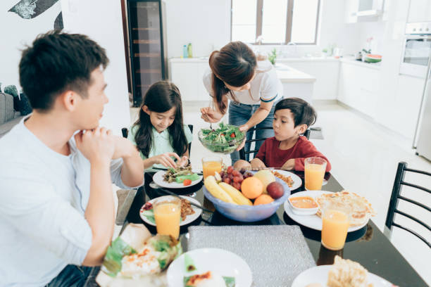istock Happy Asian ethnicity family at the table 1049473044