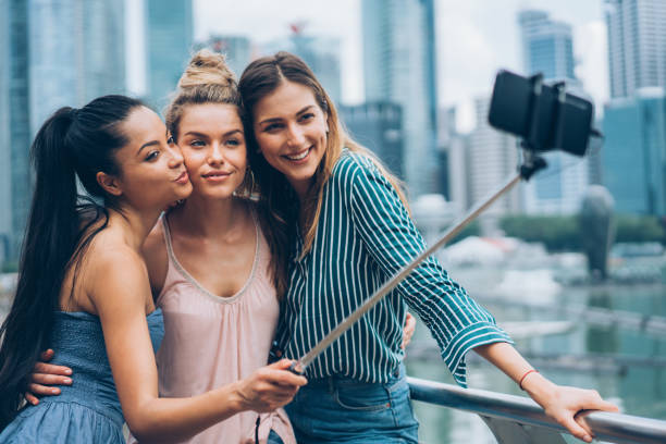 istock Young women taking selfie 1049473072