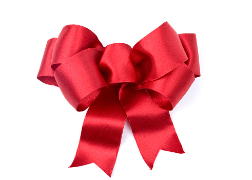 Christmas holiday red satin bow isolated on white