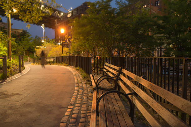 istock NYC Park Bench at Night in DUMBO Brooklyn Bridge Park in Spring 1049483936