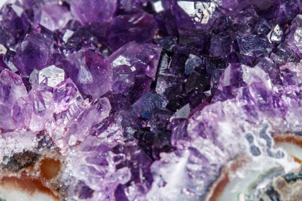istock Amethyst Crystal Druse  macro mineral on white background 1049484076