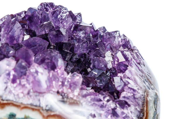 istock Amethyst Crystal Druse  macro mineral on white background 1049484556