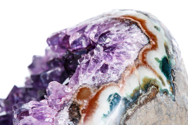 istock Amethyst Crystal Druse  macro mineral on white background 1049485028
