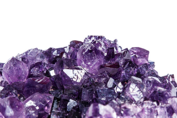 istock Amethyst Crystal Druse  macro mineral on white background 1049485080