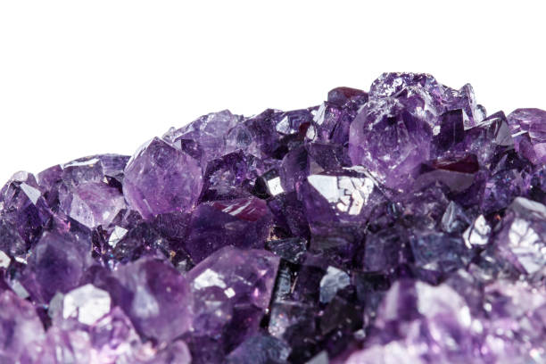 istock Amethyst Crystal Druse  macro mineral on white background 1049485704