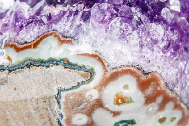 istock Amethyst Crystal Druse  macro mineral on white background 1049488068