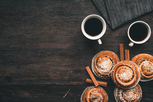 istock Traditional Swedish cinnamon bun on a wooden table 1049489390