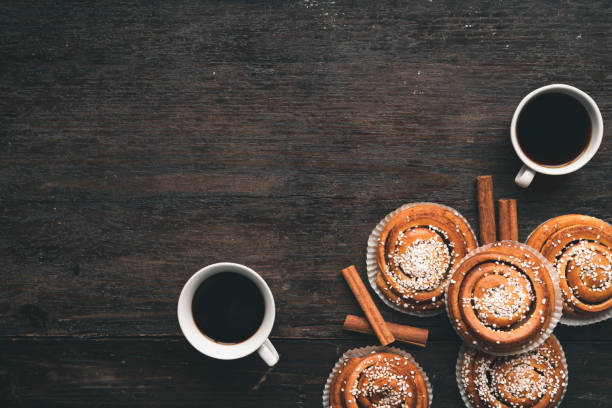 istock Traditional Swedish cinnamon bun on a wooden table 1049489394