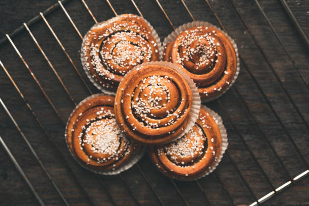 istock Traditional Swedish cinnamon bun on a oven rack 1049489504
