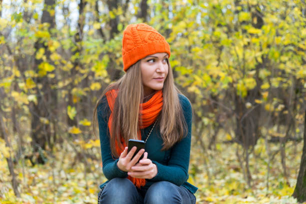 istock A girl and her phone 1049493266