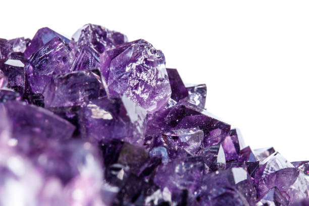 istock Amethyst Crystal Druse  macro mineral on white background 1049493308
