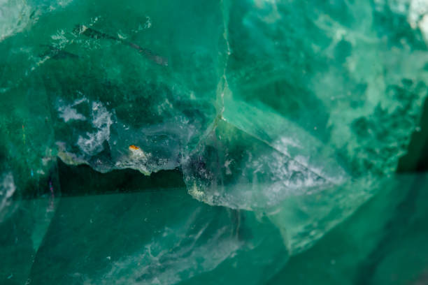 istock Macro mineral stone Fluorite crystal on a black background 1049493452