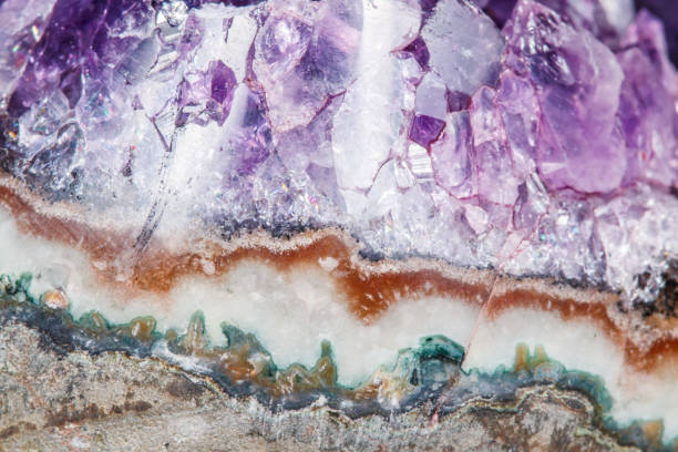 istock Amethyst Crystal Druse  macro mineral on white background 1049494008