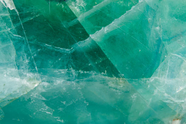 istock Macro mineral stone Fluorite crystal on a black background 1049494146
