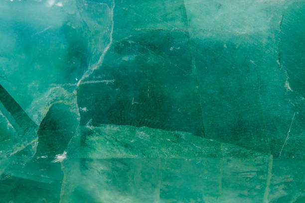 istock Macro mineral stone Fluorite crystal on a black background 1049494318
