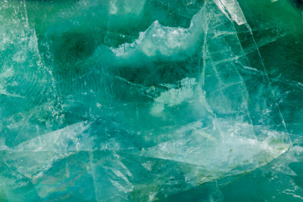 istock Macro mineral stone Fluorite crystal on a black background 1049494372