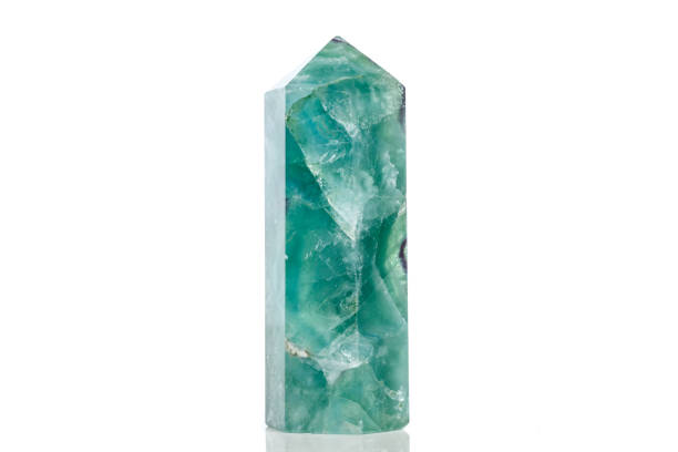 istock Macro mineral stone Fluorite crystal on a black background 1049494432