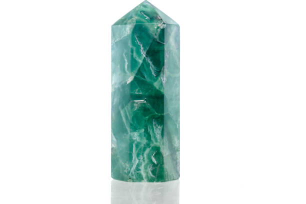 istock Macro mineral stone Fluorite crystal on a black background 1049494694