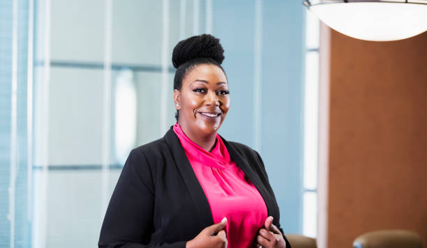 istock African-American woman working in office 1049501696