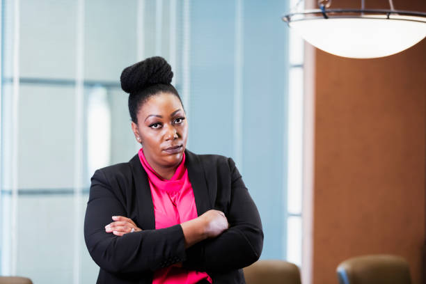 istock African-American woman working in office 1049502020