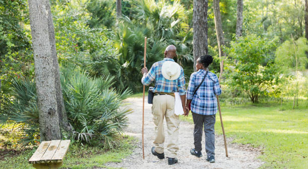 istock Senior African-American couple hiking, exploring 1049505556
