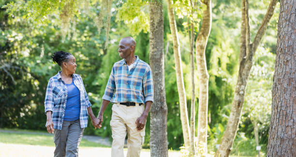 istock Senior African-American couple hiking, exploring 1049508900