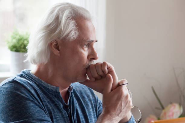 istock Worried serious senior man looking away feeling anxious about problems 1049512804