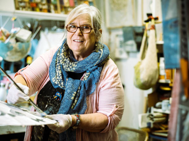 istock Senior woman artist at work 1049513666