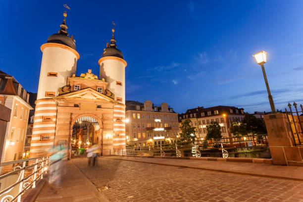 istock Heidelberg Old bridge with gate at night 1049516674