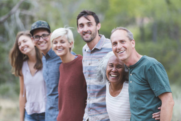 istock Multi-generational of friends posing together outside 1049520302