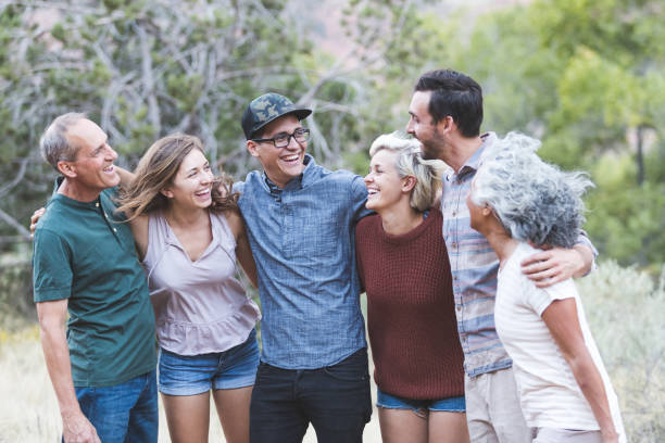 istock Multi-generational of friends posing together outside 1049520312