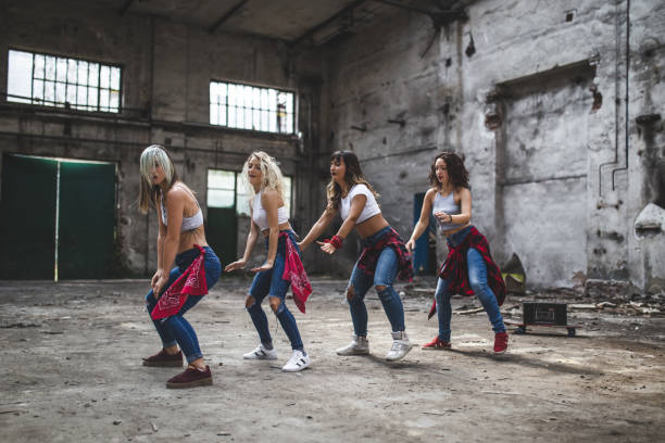istock Hip-Hop dance in old warehouse 1049537816