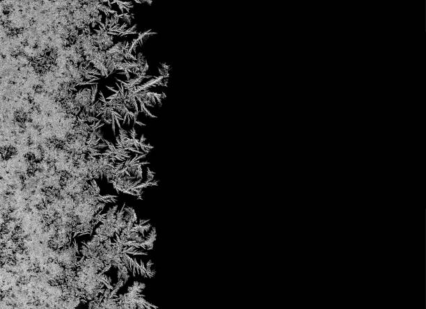 Natural ice crystals frostwork on dark backround. Macro closeup. stock photo