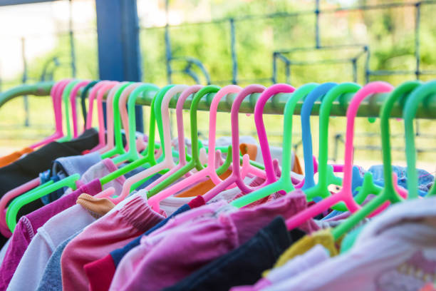 istock Colorful clothes Hanger on a shelf 1049550668