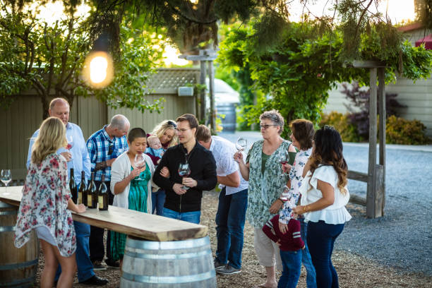 istock Families and Friends Enjoying a Wine Tasting 1049551654